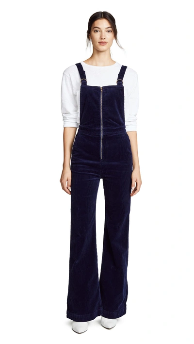Shop Rolla's East Coast Flare Overalls In Midnight Cord