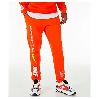 Shop Nike Men's Sportswear Microbranding Jogger Pants, Orange