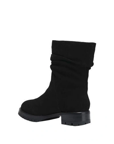 Shop Dkny Ankle Boot In Black