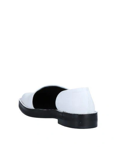 Shop Miista Loafers In White