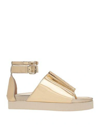 Shop Ellery Flip Flops In Gold