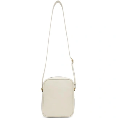 Shop Gucci Off-white Logo Messenger Bag In 8820 Ivory