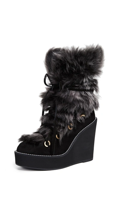 Shop Stuart Weitzman Nikita Boots In Black