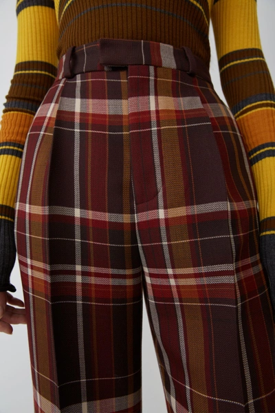Shop Acne Studios Madras Trousers Brown/burgundy