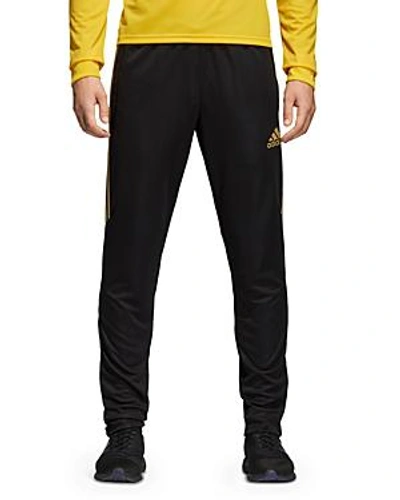 Shop Adidas Originals Tiro Active Training Pants In Black / Gold