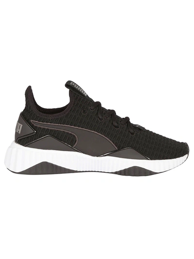 Shop Puma Defy Sneakers In Black/white