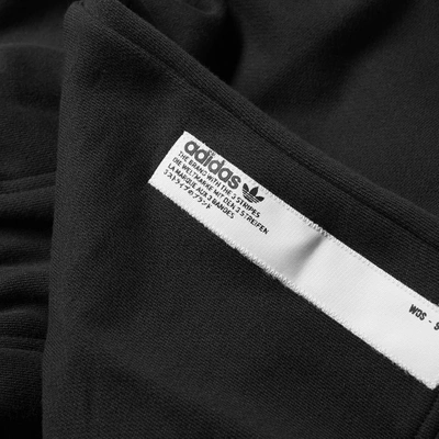 Shop Adidas Originals Adidas Nmd 7/8 Pant In Black