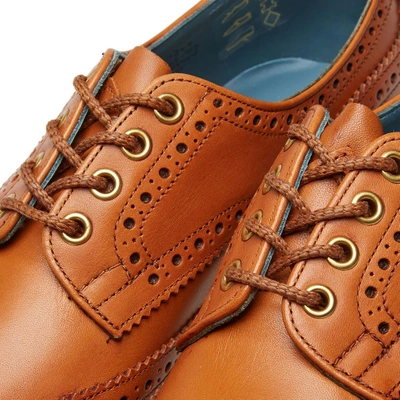 Shop Tricker's Bourton Vibram Sole Brogue In Yellow