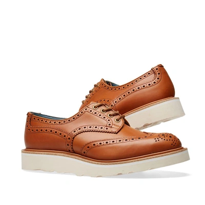 Shop Tricker's Bourton Vibram Sole Brogue In Yellow