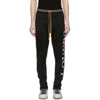 Shop Amiri Black 'lovers' Track Pants