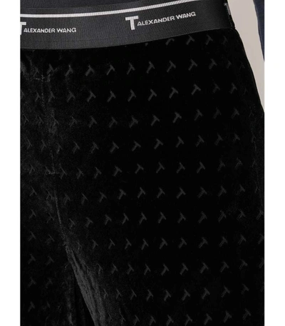 Shop Alexander Wang T Black Monogram Print Flared Trousers