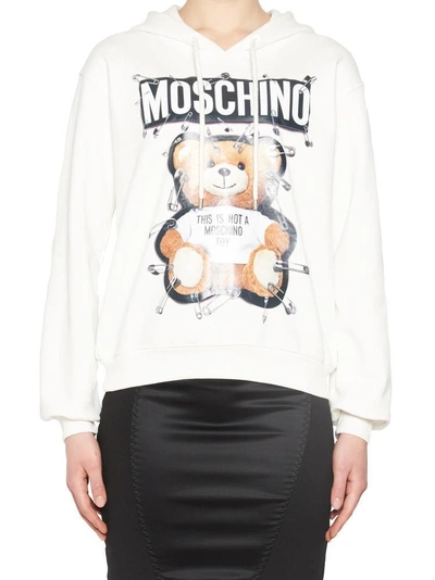 Shop Moschino Teddy Pin Hoodie In White