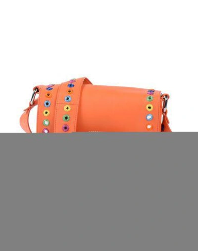 Shop Moschino Cross-body Bags In Orange