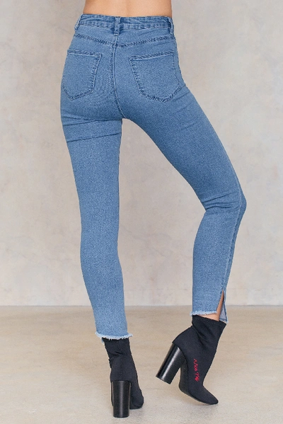 Shop Na-kd Highwaist Long Side Slit Jeans Blue In Light Blue