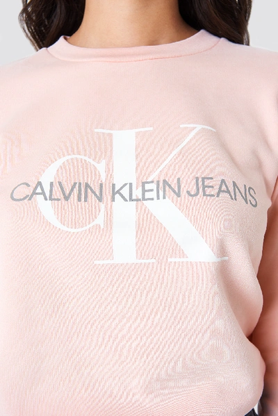 Shop Calvin Klein Monogram Logo Sweatshirt - Pink