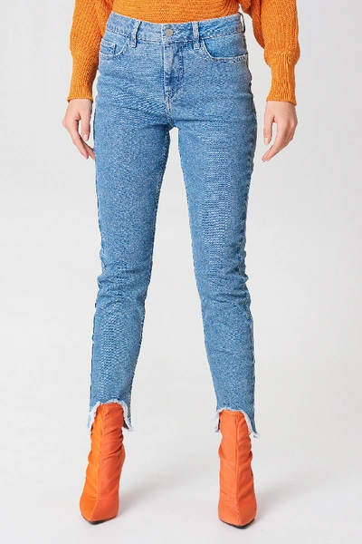 Shop Na-kd Skinny Asymmetric Hem Denim Blue In Mid Blue