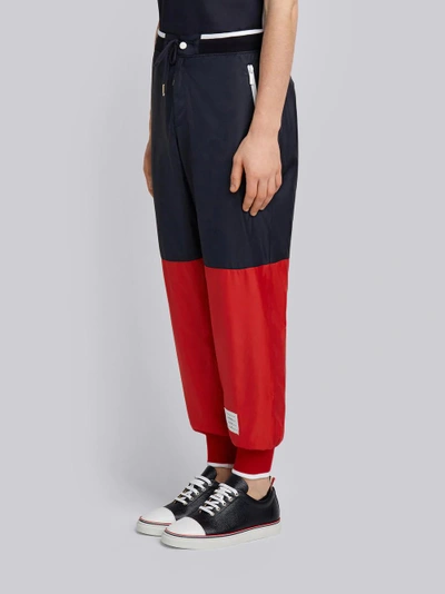 Shop Thom Browne Bicolor Half-and-half Ripstop Sweatpants In Red