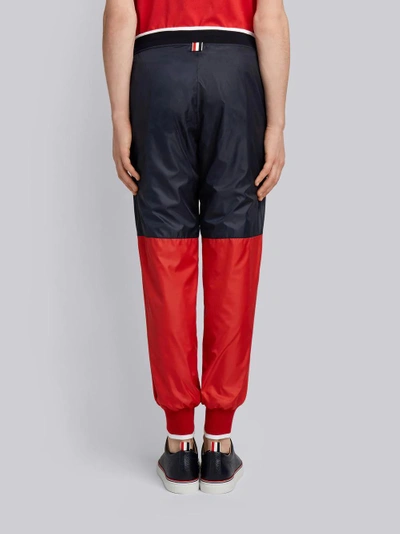 Shop Thom Browne Bicolor Half-and-half Ripstop Sweatpants In Red