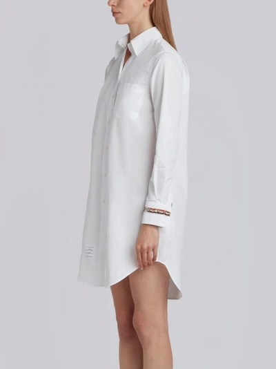 Shop Thom Browne Classic Long Sleeve Button Down Point Collar Thigh Length Shirtdress With Jewelry Appliq In White