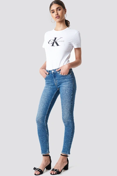 Shop Calvin Klein Mid Rise Skinny West Blue In Chico Blue