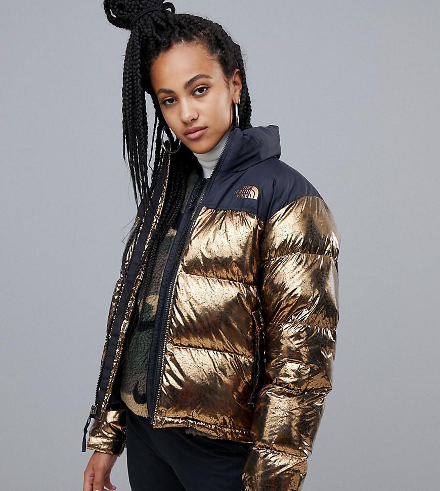 the north face womens 1996 retro nuptse jacket in copper