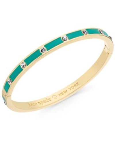 Shop Kate Spade New York Gold-tone Crystal Enamel Hinged Bangle Bracelet In Clear Emerald