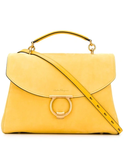 Shop Ferragamo Gancini Top Handle Bag In Yellow