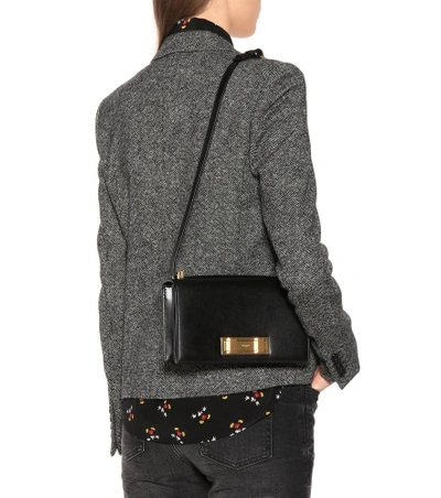 Shop Saint Laurent Domino Leather Shoulder Bag In Black