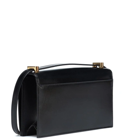 Shop Saint Laurent Domino Leather Shoulder Bag In Black