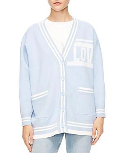 Shop Sandro Opera Love Striped Trim Cardigan In Sky Blue