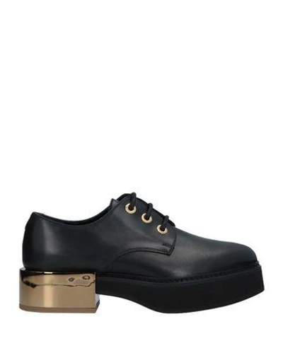 Shop Alexander Mcqueen Laced Shoes In Black