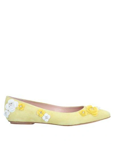 Shop Moschino Ballet Flats In Light Yellow