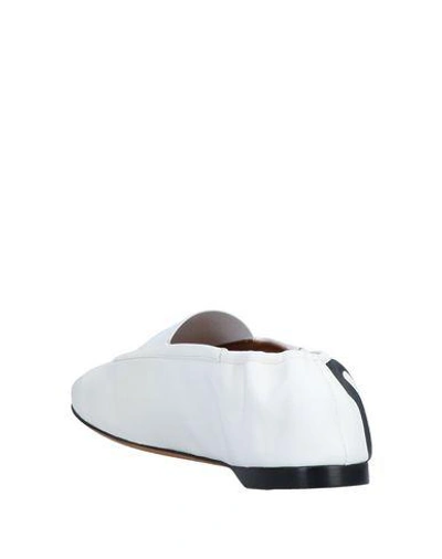 Shop Givenchy Ballet Flats In White