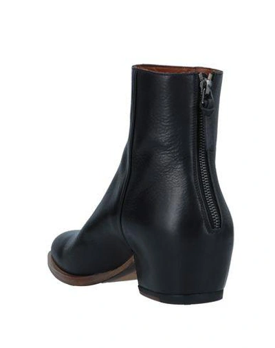 Shop Givenchy Boots In Black