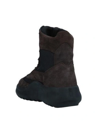 Shop Yeezy Boots In Dark Brown