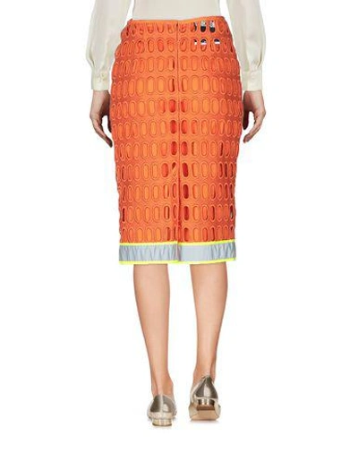 Shop Moschino Knee Length Skirts In Orange