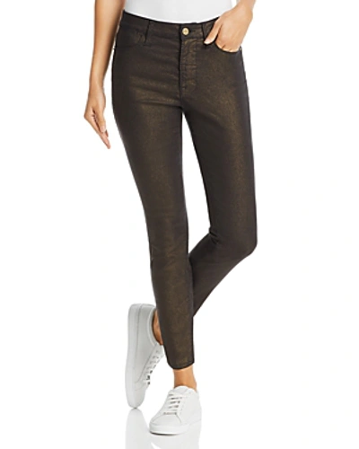 Shop Frame Le High Skinny Metallic Jeans In Old Gold