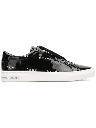 Shop Dkny All Over Logo Sneakers In Black