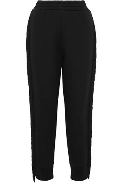 Shop Stella Mccartney Fringe-trimmed French Cotton-blend Terry Track Pants In Black