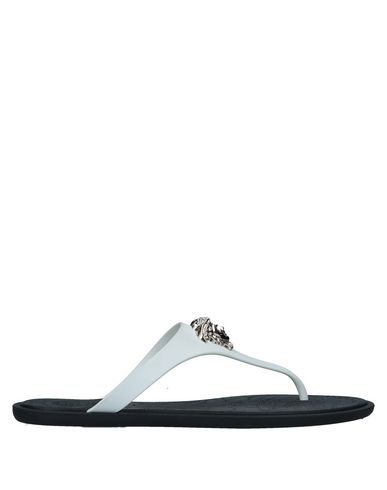 white versace flip flops