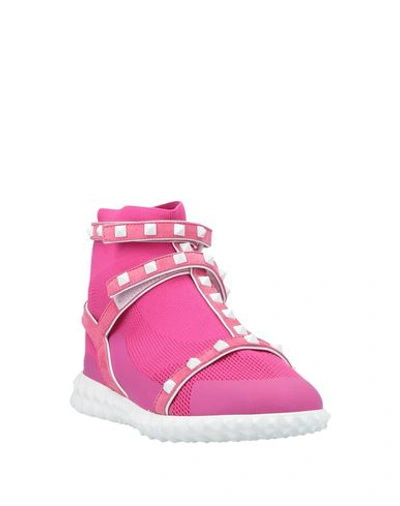 Valentino Free Rockstud High-top Sneakers In Fuchsia