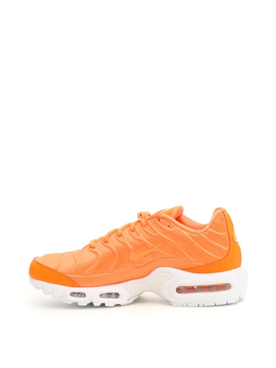 Shop Nike Air Max Plus Se Sneakers In Or/white (orange)