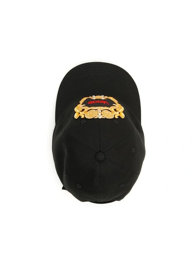 Shop Versace Baseball Cap In Black Gold