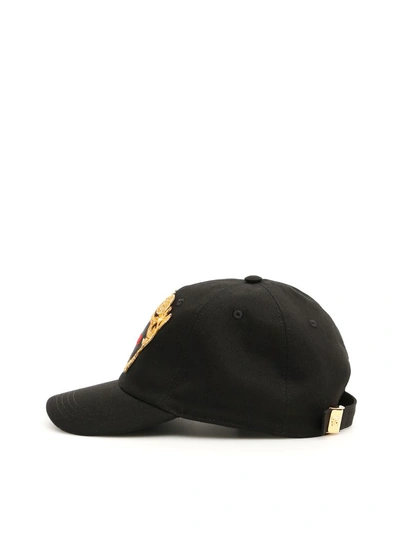 Shop Versace Baseball Cap In Black Gold