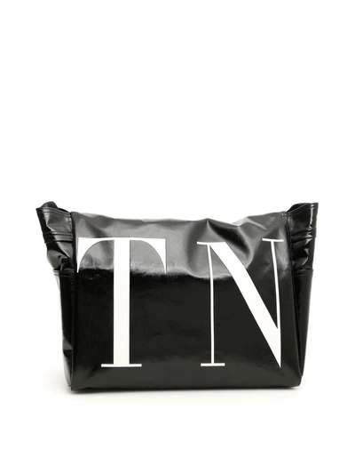 Shop Valentino Vltn Messenger Bag In Nero Bianco