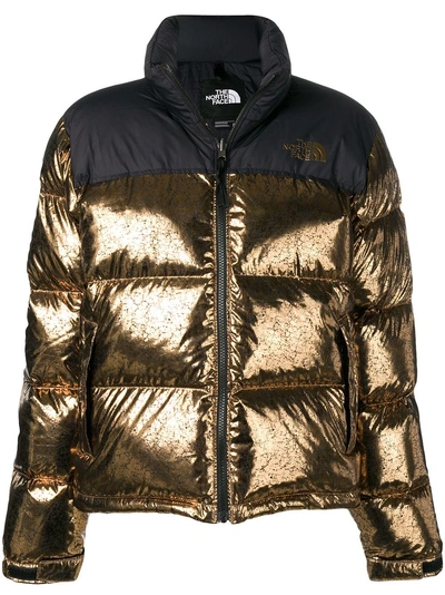 The North Face Metallic Puffer Jacket In Gold | ModeSens