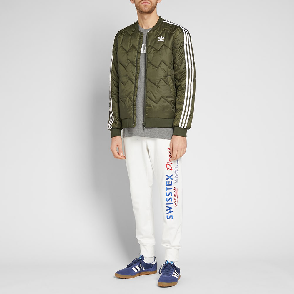 Komisks piramīda priede adidas originals sst quilted jacket rot ķīlnieks  Reibonis Brīnums