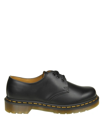 Shop Dr. Martens' Laced In Black Leather