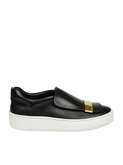 Shop Sergio Rossi Slip-on In Black Leather With Metal Plate In Gold Contrast