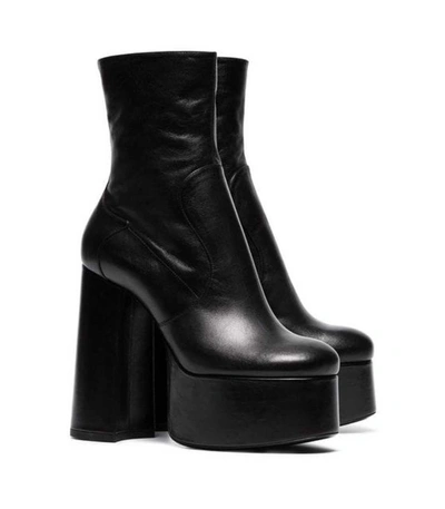 Shop Saint Laurent Platform Ankle Boots In Black